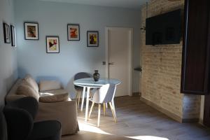 Posezení v ubytování Apartamentos Reyes Catolicos 14