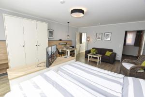 Et tv og/eller underholdning på Appartement Rehn Büsum