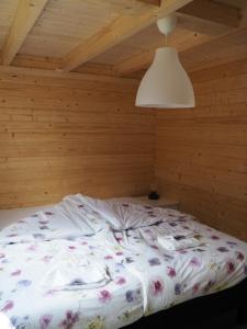 Postel nebo postele na pokoji v ubytování Polderlodge