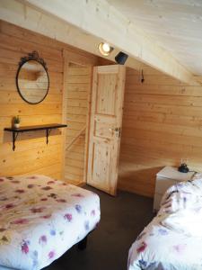 Postel nebo postele na pokoji v ubytování Polderlodge
