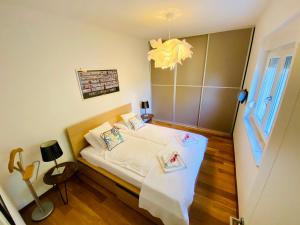 Postel nebo postele na pokoji v ubytování Apartment AlMare