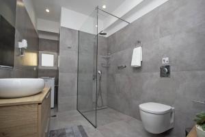 Koupelna v ubytování Vidos Seaview Suite + 21 fotografií