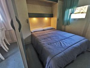 Postel nebo postele na pokoji v ubytování Bungalow As Nevedas