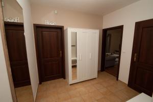 A bed or beds in a room at Vila Olívia - Apartmán Olívia 1