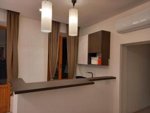 Kuchyňa alebo kuchynka v ubytovaní Dimora50 Apartament