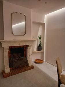 Posteľ alebo postele v izbe v ubytovaní Dimora50 Apartament
