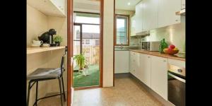 Kuchyň nebo kuchyňský kout v ubytování GUEST HOUSE BOLTAÑA + 2 fotografie