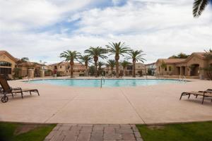 Gated townhouse with 2 suites, heated pool, hot tub