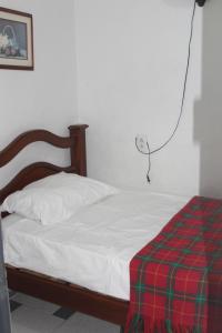 Postel nebo postele na pokoji v ubytování Hospedaje Primavera + 1 fotografie