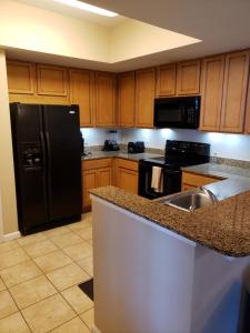 
A kitchen or kitchenette at A Slice of Heaven Destin - Pool & Ocean View
