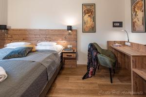 A bed or beds in a room at Eger Castle Hill Premium Apartments