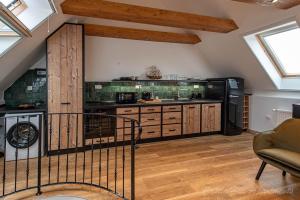 A kitchen or kitchenette at Eger Castle Hill Premium Apartments