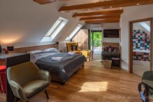 A bed or beds in a room at Eger Castle Hill Premium Apartments
