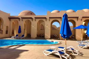 Bazén v ubytování Comfy apt by Sentido Marsa Alam nebo v jeho okolí