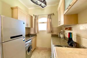 Kuchyň nebo kuchyňský kout v ubytování Comfy apt by Sentido Marsa Alam