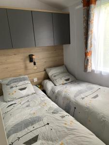 Postel nebo postele na pokoji v ubytování Rêverie d’été