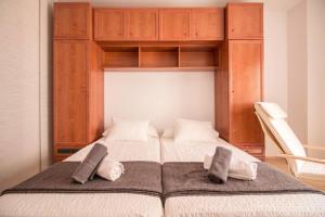 Postel nebo postele na pokoji v ubytování Apartamentos Pintada 11