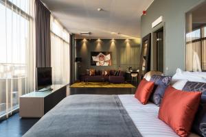 Tempat tidur dalam kamar di Quality Hotel Globe