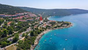 an aerial view of a beach with boats in the water at Villa Sofia in Martinšćica