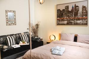 Posteľ alebo postele v izbe v ubytovaní Comfort Studio