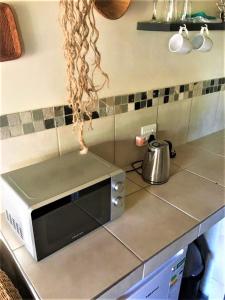 Kuchyň nebo kuchyňský kout v ubytování Bedrock Executive Studio Sea Facing