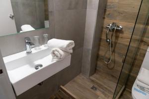Koupelna v ubytování Roxani Hotel