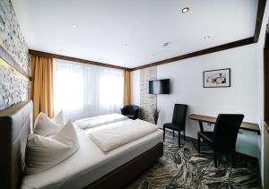 TV a/nebo společenská místnost v ubytování Central City Hotel