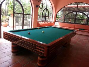 a room with a pool table in a room at Agriturismo Gianferrante in Paterno