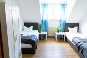 Voodi või voodid majutusasutuse SUNNYHOME Monteurwohnungen und Apartments in Schwandorf toas