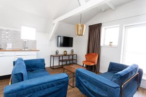 TV a/nebo společenská místnost v ubytování Hotel Markt23