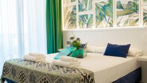 Hotel Playa de la Plata客房内的一张或多张床位