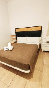 Posteľ alebo postele v izbe v ubytovaní Hostal Balkonis