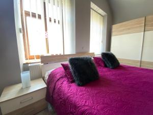 Posteľ alebo postele v izbe v ubytovaní Penzión Hradby
