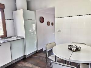 Kuchyň nebo kuchyňský kout v ubytování Casa Barizo- Malpica