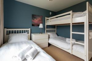 Ένα ή περισσότερα κρεβάτια σε δωμάτιο στο Tigh na Lochan