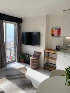 Foto da galeria de Luxe studio/suite met zeezicht en volle zon em Knokke-Heist