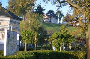 a house on a hill with a house on top of it at Appartementanlage Villa Granitz 45 in Göhren