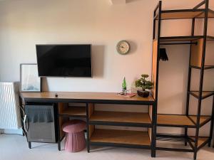 TV a/nebo společenská místnost v ubytování Nova Apartamenty Rewa