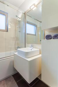 Kúpeľňa v ubytovaní Apartman LAURA