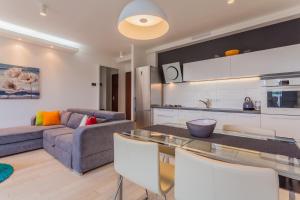 Kuchyňa alebo kuchynka v ubytovaní Apartman LAURA