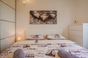 Posteľ alebo postele v izbe v ubytovaní Apartman LAURA + 7 fotografií