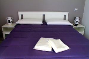 Posteľ alebo postele v izbe v ubytovaní B&B I Krotoniati