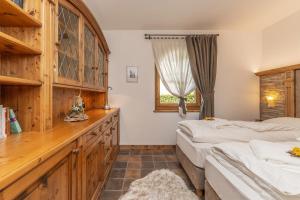 Posteľ alebo postele v izbe v ubytovaní Chalet Mountain Plaza - Apt Garden