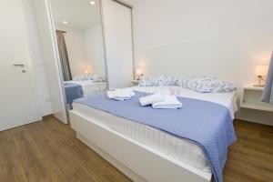 Posteľ alebo postele v izbe v ubytovaní Penthouse With Panoramic View Ally