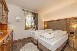 Posteľ alebo postele v izbe v ubytovaní Chalet Mountain Plaza - Apt Garden