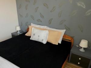 Posteľ alebo postele v izbe v ubytovaní Bóbita Apartman