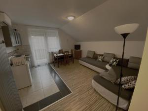 Kuchyňa alebo kuchynka v ubytovaní Bóbita Apartman