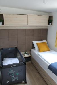 Posteľ alebo postele v izbe v ubytovaní Two Sisters mobile home