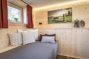 Postel nebo postele na pokoji v ubytování STAUDACH - Alpinresidenz Zillertal