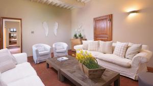 A seating area at CA MAGGIORE 10&2, Emma Villas
